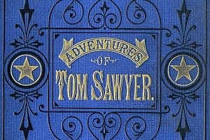 Image shows the front cover of the Adventures of Tom Sawyer.