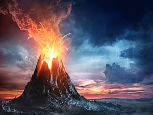 Image shows a volcano erupting.