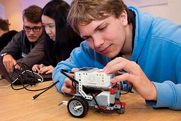 Students working on robotics at our Cambridge Engineering Summer School