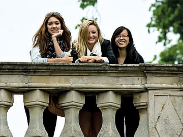 Cambridge Summer School: three girls on balcony