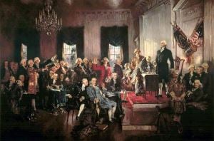 Image shows the painting 'Scene at the Signing of the Constitution of the United States' by Howard Chandler Christy. 