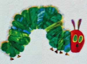 Image shows the eponymous caterpillar from The Very Hungry Caterpillar.