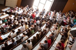 Image shows a full lecture theatre. 