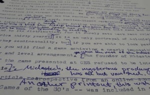 Image shows an essay covered in notes.