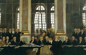 Image shows the signing of the Treaty of Versailles.