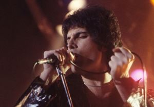 Image shows Freddie Mercury performing in 1978.
