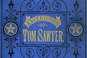 Image shows the front cover of the Adventures of Tom Sawyer.