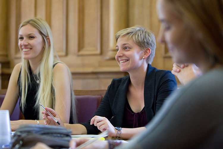 Financial Strategy and Risk Management Summer School - students smiling during lecture